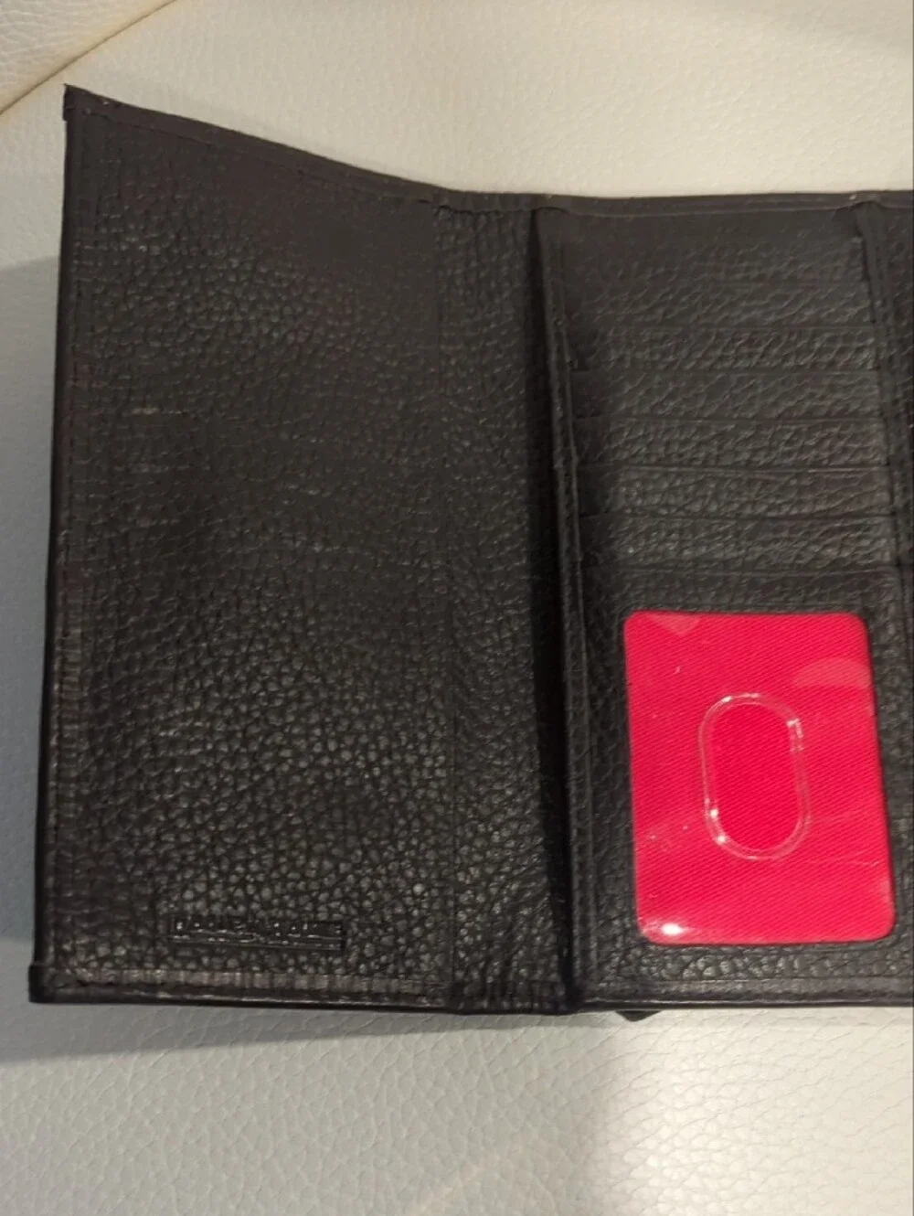 Dooney & Bourke Black Pebbled Leather Flap Wallet with Gold Plaque